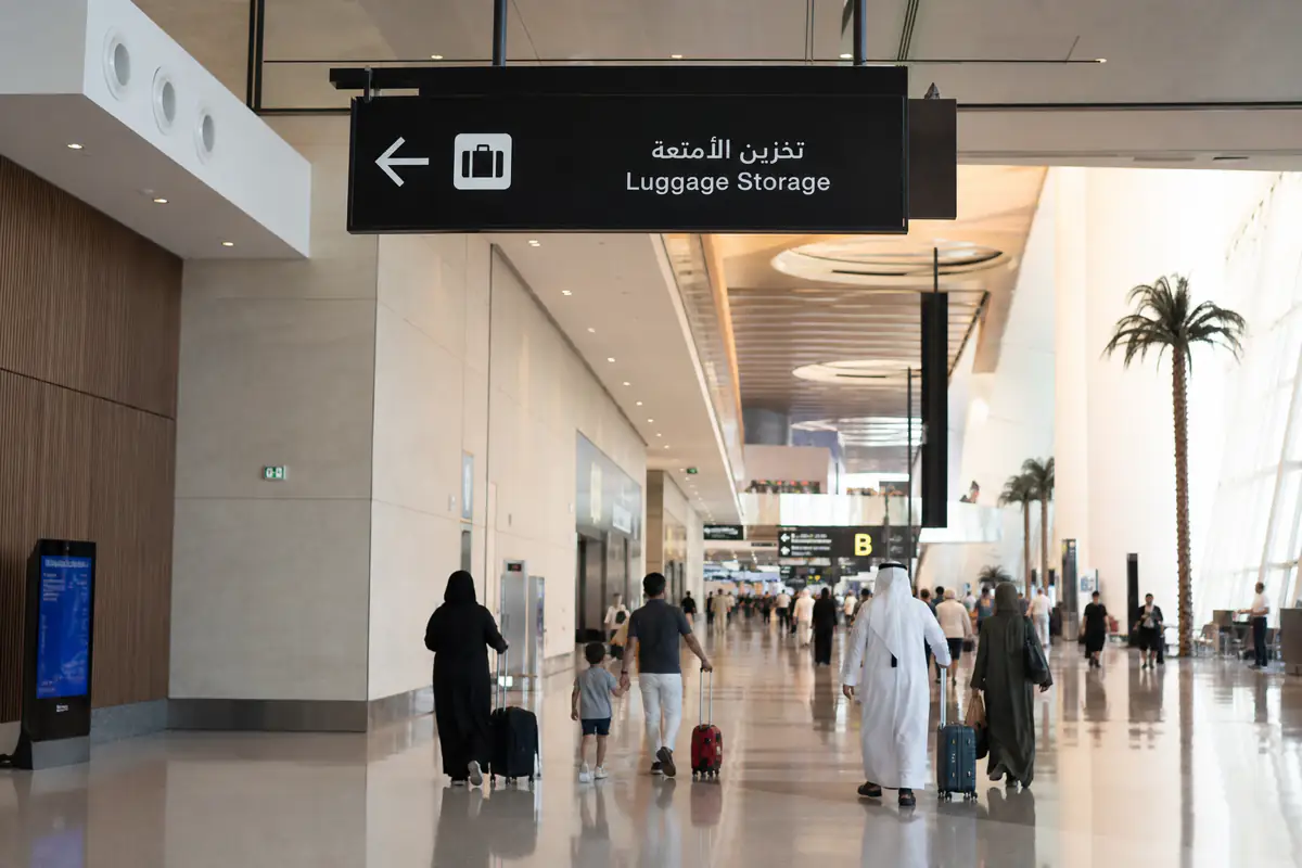 Doha Airport luggage storage sign inside Hamad International Airport terminal